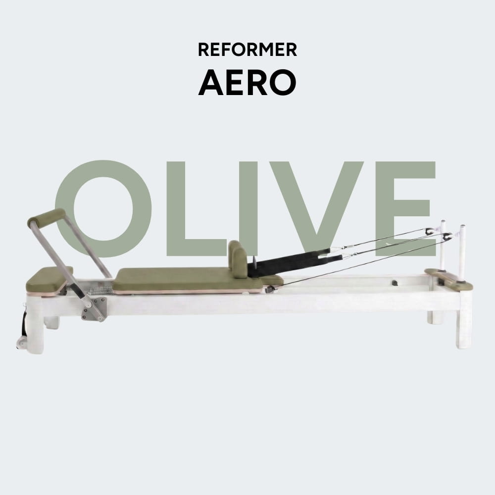 Reformer Pilates AERO Olive complet cadre blanc plateau bois et coussin tissu olive avec texte superposé