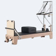 Reformer Pilates angle droit logo gravé plateforme noire antidérapante bloc noir sangles