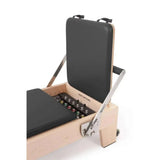 Mécanisme arrière Reformer Pilates Elite avec accessoire Jump Board et boutons de réglage