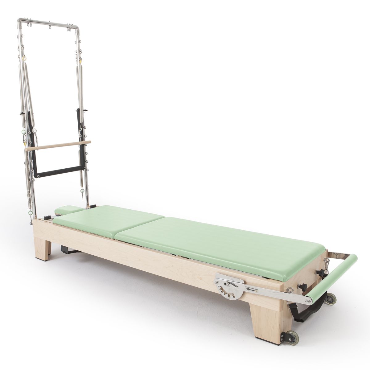 Reformer Pilates Elite en bois clair avec coussins vert menthe et finition apaisante