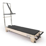 Reformer Pilates Elite en bois d'érable massif avec coussins noirs et design minimaliste